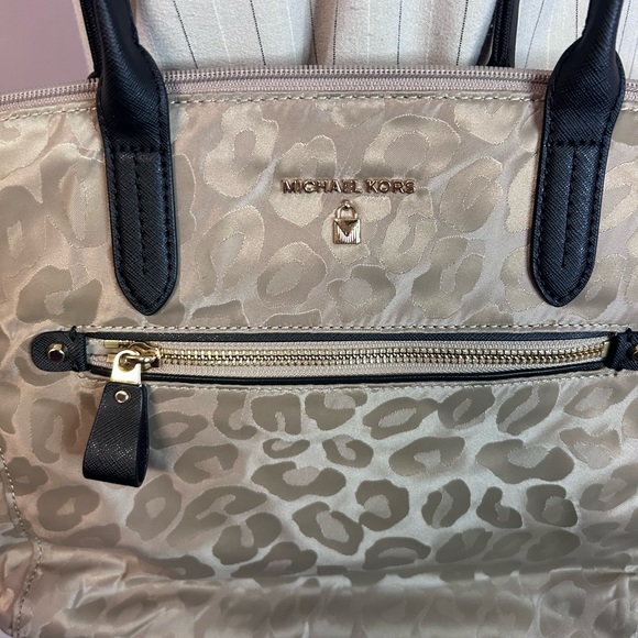 Michael Kors tan and black cheetah print handbag with lots of storage. - Picture 10 of 13